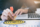 Businessman holding red dart push on target. Business strategy planning success target goals. Business development concept